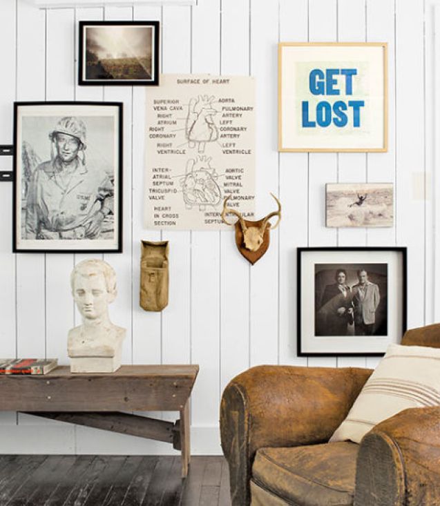 Antique bench, military bag and horns provided by Garden Style Living and design by LeanneFordInteriors.com as seen in Country Living magazine
