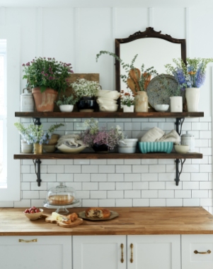 Vintage cello cutting board, vintage mirror from: Garden Style Living / Pictured from: HGTV's Restored by the Fords / Design: Leanne Ford Interiors / Photo: Alexandra Ribar